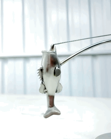 🎣Fiskaren balanserar skulptur